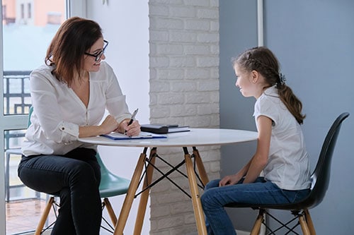 Therapist meets with child