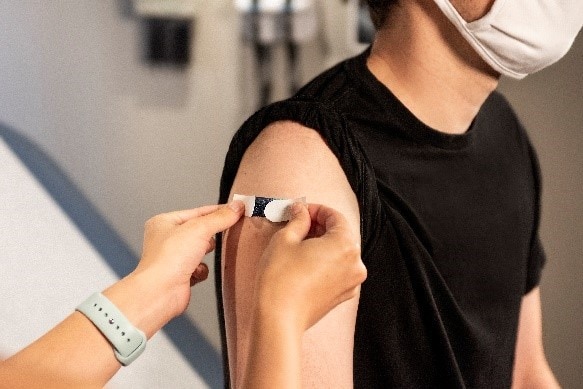 A man receiving a vaccine