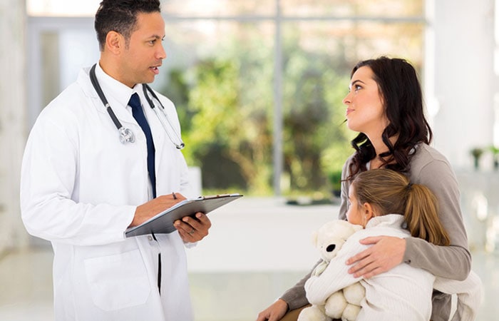 A mother and daughter meet with their doctor