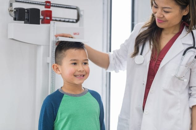 Image of boy at doctors office.