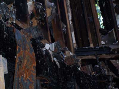 first floor framing after entire floor joist consumed by fire