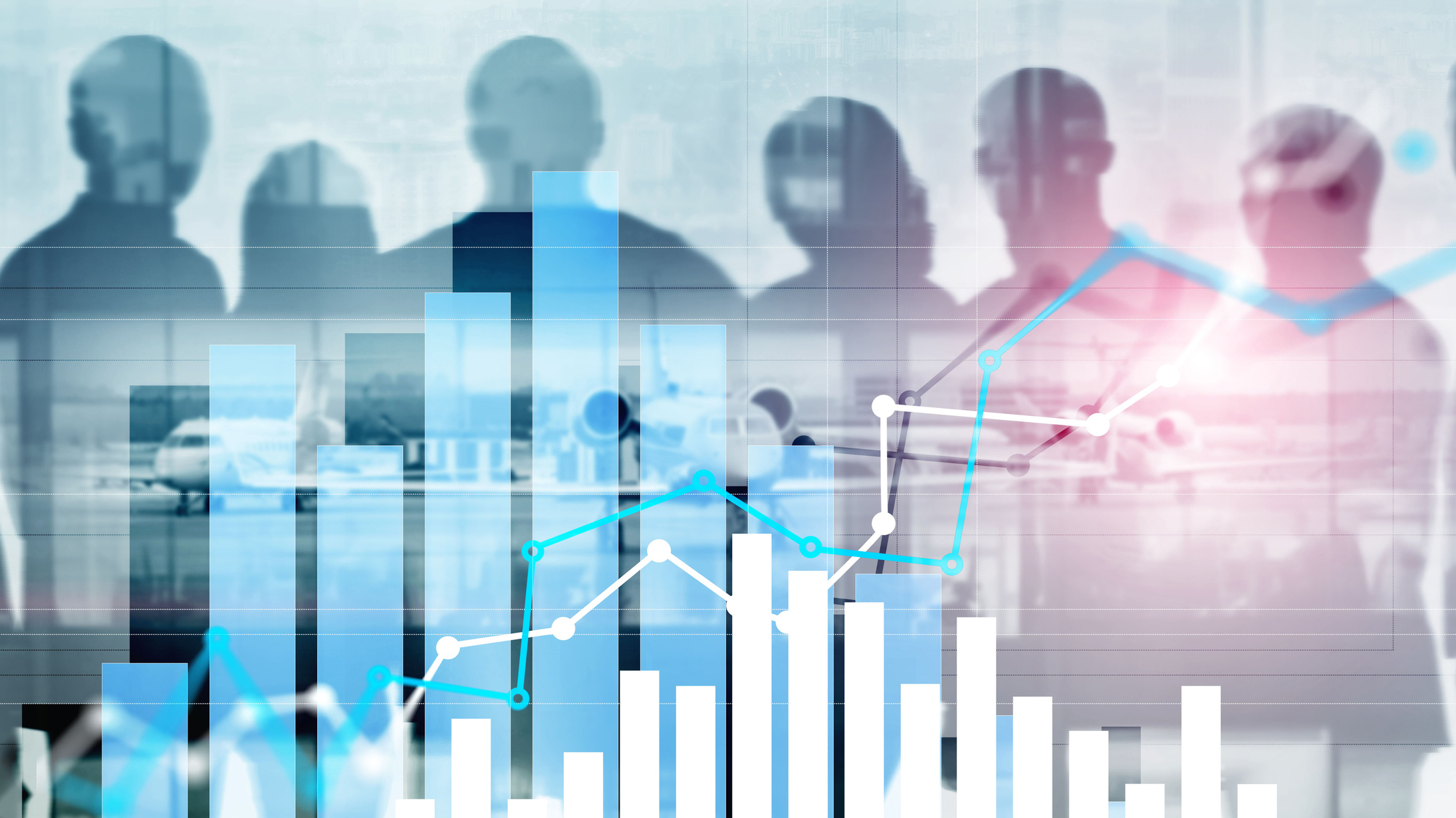 Silhouettes of people behind a bar graph.