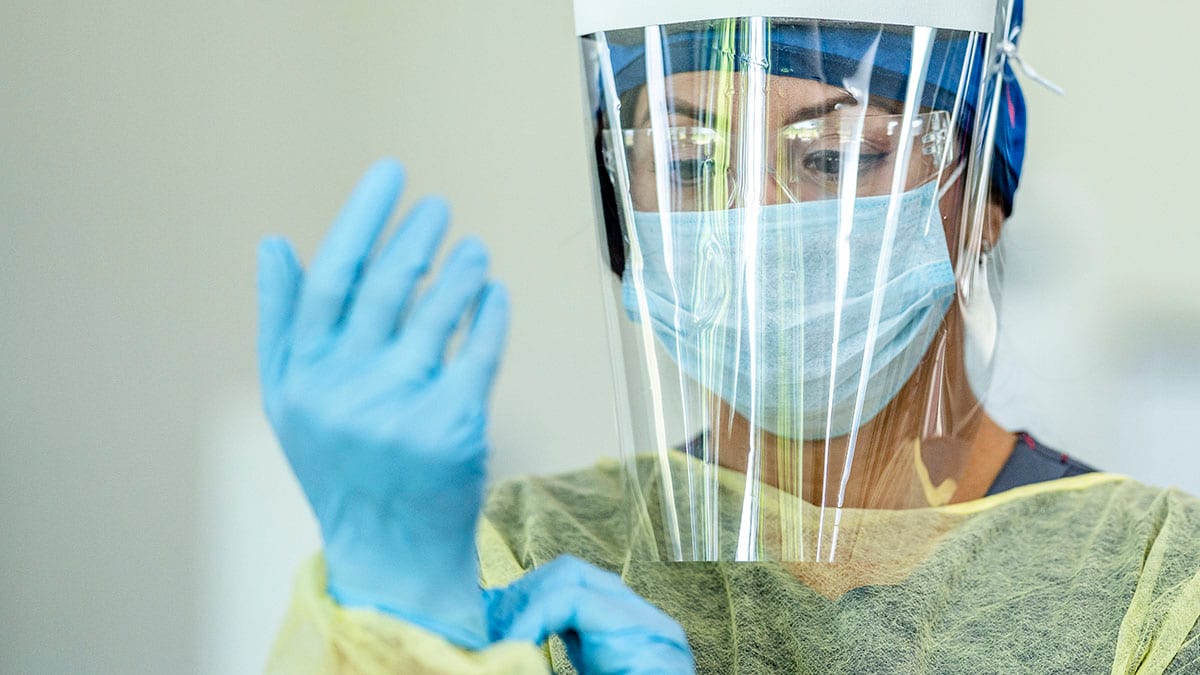 Close up of a female doctor wearing personal protective equipment (PPE).