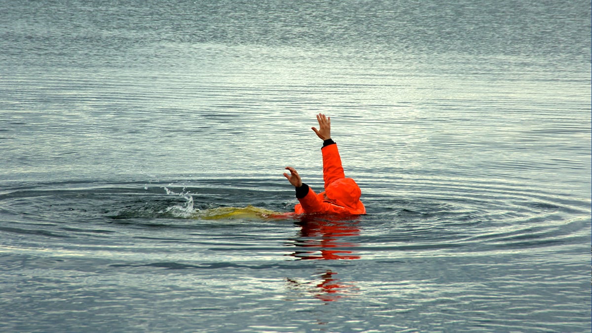 image of a lone commercial fisherman in the water