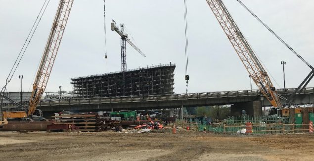 heavy machinery constructing a building