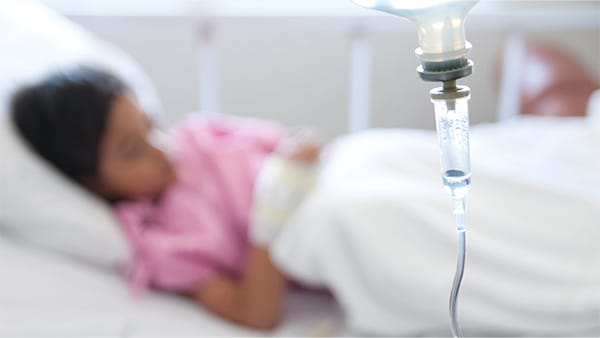 Child in hospital bed