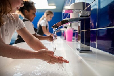 Children washing hands at school