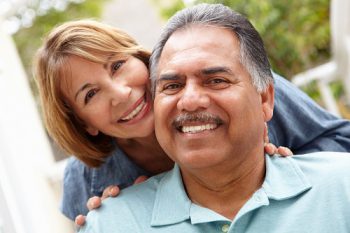 Senior couple relaxing in garden