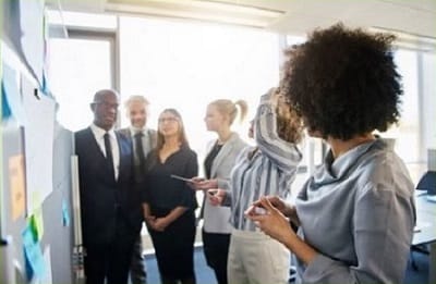 A group of workers in a meeting