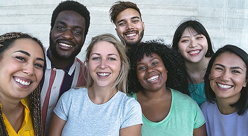 Diverse group of young, happy adults.