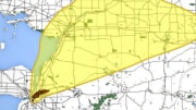 An arial view of a city map with colored circles and shapes indicating areas of blast/thermal damage and radiation exposure due to fallout.