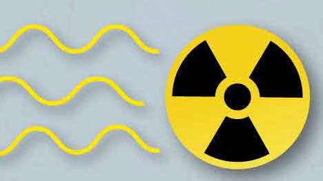 Drawing of yellow radiation waves traveling through the air from the yellow and black radiation symbol.