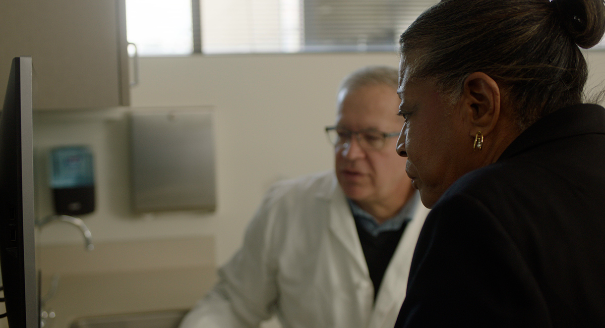 Doctor talking with patient.