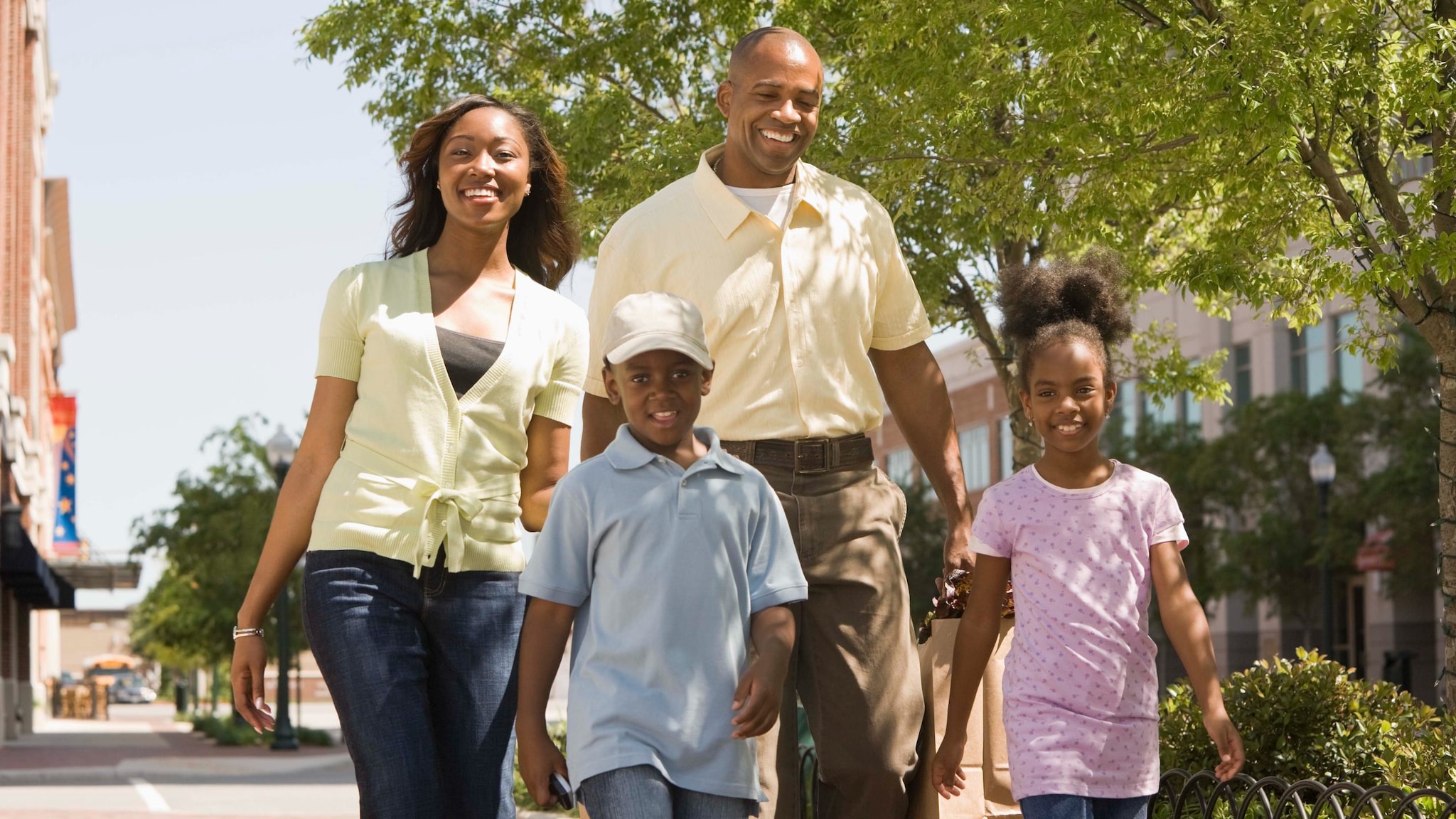 Family Walking Outdoors in the City