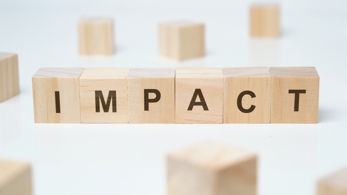 Building blocks that spell the word "Impact"