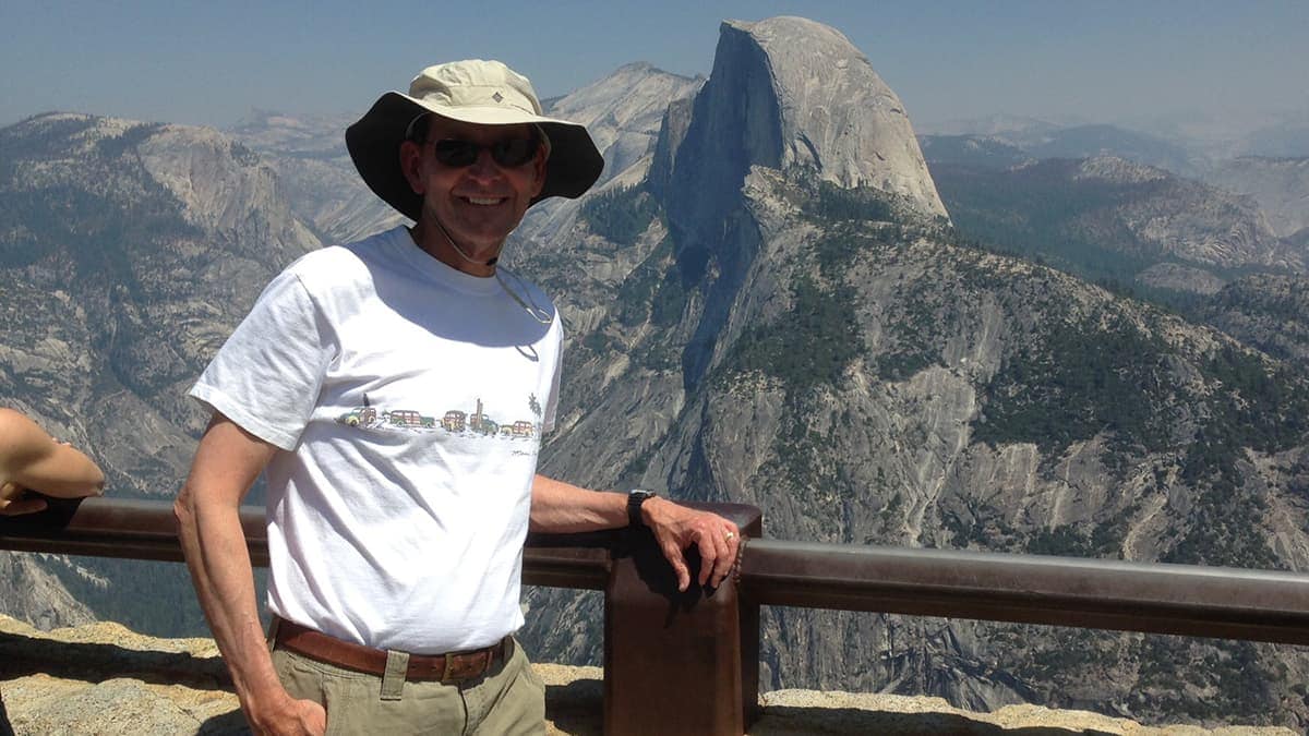 Bob wearing his wide-brimmed hat while checking out Half Dome in Yosemite National Park.