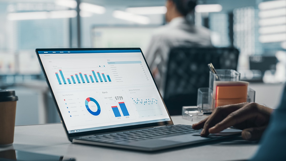 Data charts on laptop