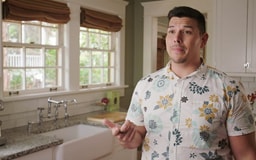 Hawaiian male standing in kitchen talking to camera