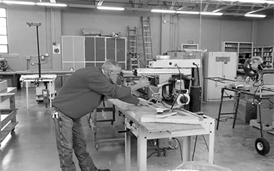 Picture of Jerry, a TB survivor, working as an electrician