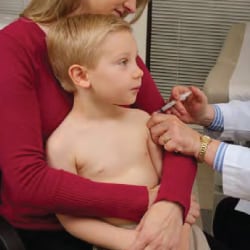 Mom with child during vaccination