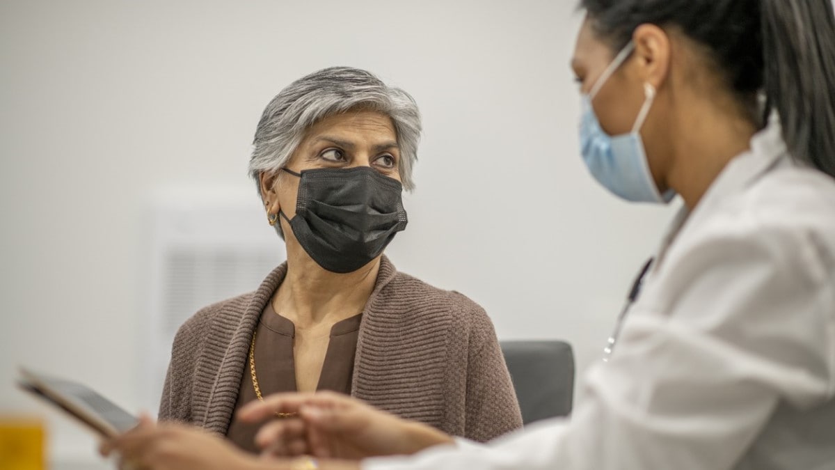 a woman talking to her doctor