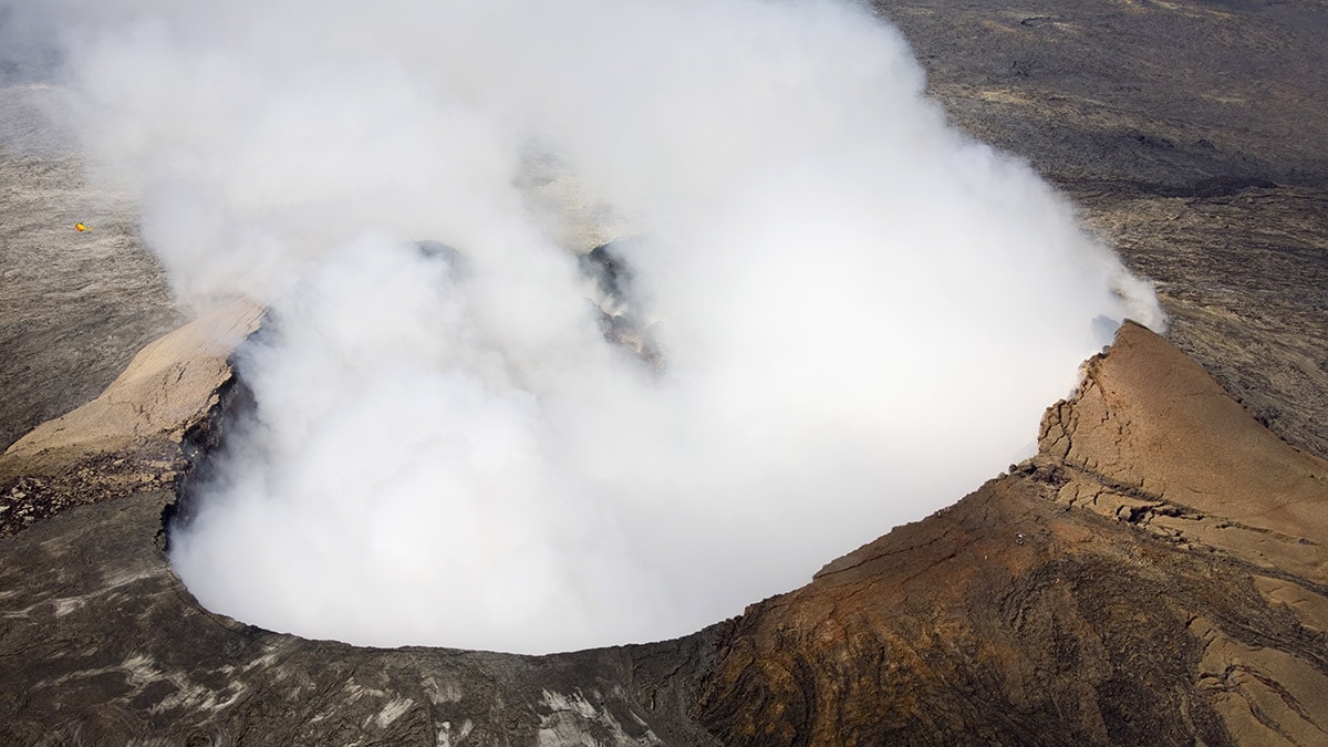 Cloud of ash rising from an active volcano