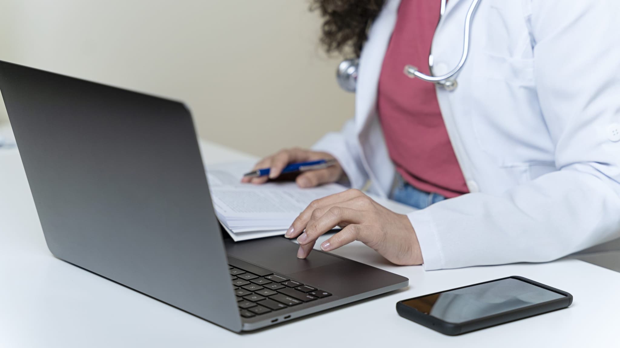 Doctor looking at a computer