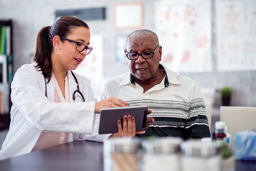 Photo of a doctor talking with a patient